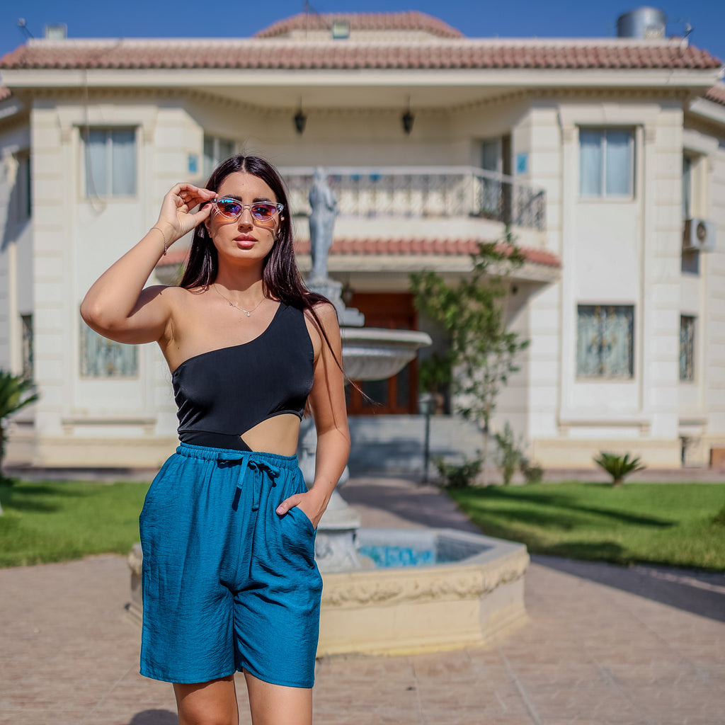 شورت كتان بلون أزرق مخضر من لا رين 