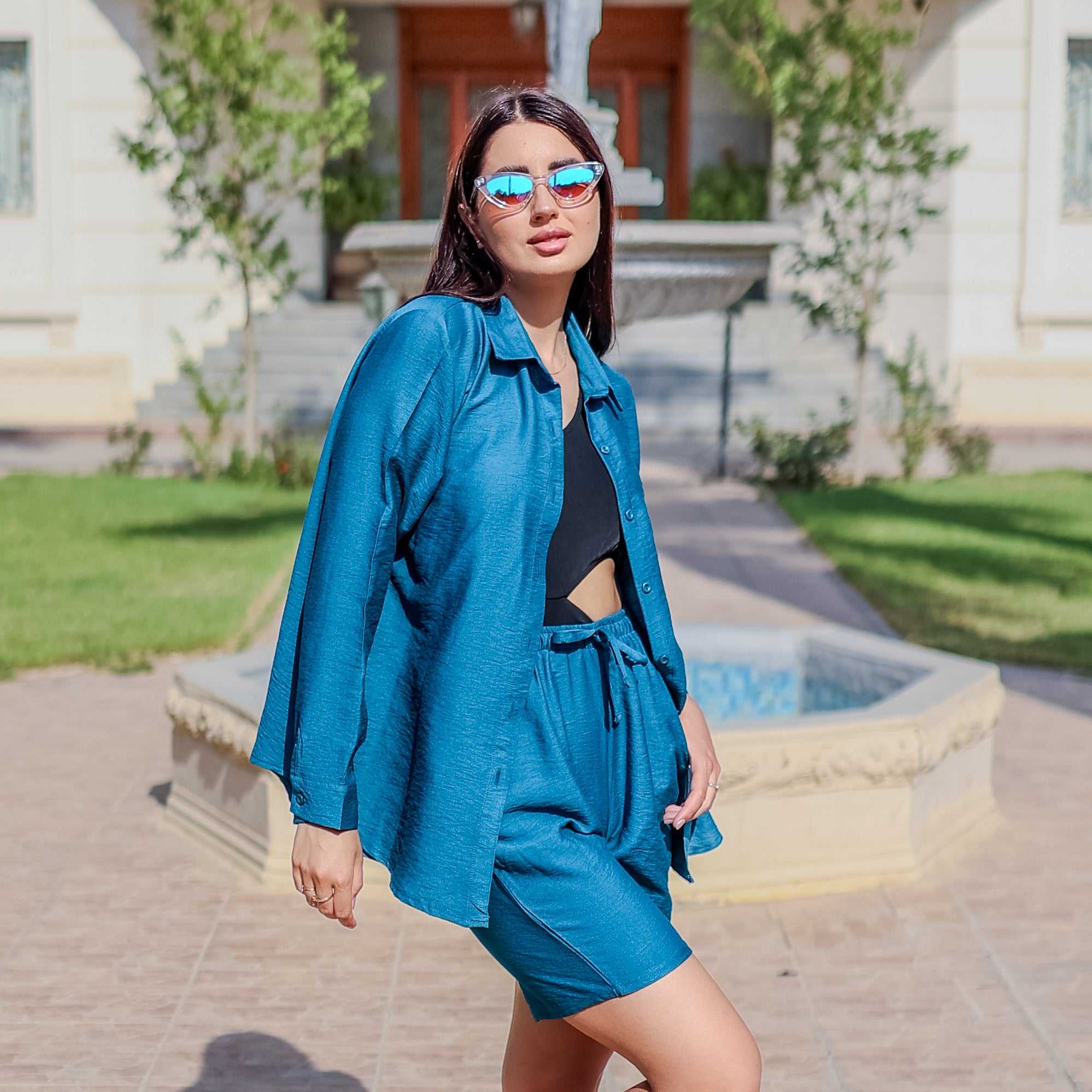 شورت كتان بلون أزرق مخضر من لا رين 