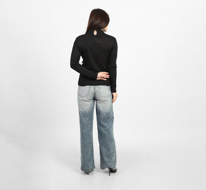 La Reine Black Ribbed Knit Mock Neck Blouse with Side Buckle Detail