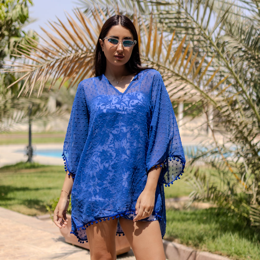 غطاء أزرق مطرز بنقاط سويسرية من لا رين